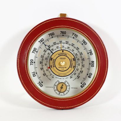 JAEGER LECOULTRE Baromètre thermomètre circulaire en cuir piqué sellier. Diamètre...