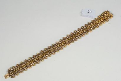 null Bracelet ancien en or jaune 18K (750/oo) à maillons entrecroisés et torsadés...