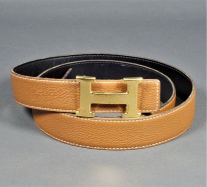 null HERMES. Ceinture, réversible noir et gold. Boucle H finition doré. Quelques...