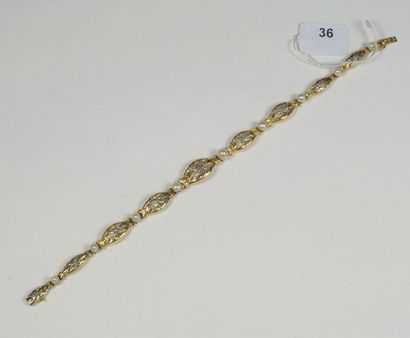 Bracelet ancien en or jaune 18K (750/oo)...