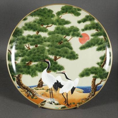 null Douze assisettes en porcelaine à décor d'oiseaux Travail de style Japonnais....