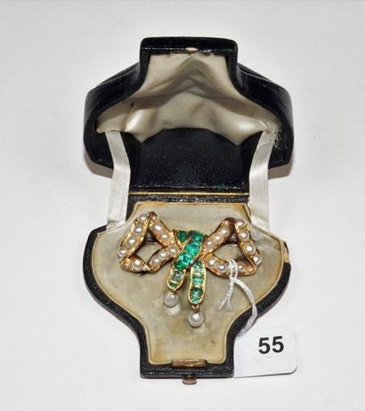 null Broche pendentif ancienne en or jaune 18K (750/oo) figurant un noeud serti de...