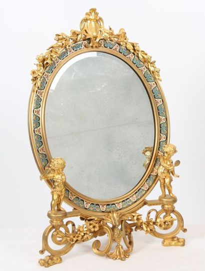 null GILDED BRONZE TABLE MIRROR "TO THE SMALL BALL PLAYERS" OF BARBEDIENNE

In gilt...