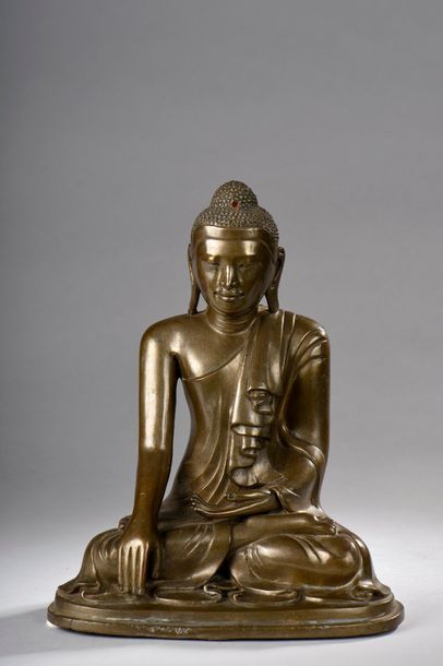 null Buddha Maravijaya sitting in bumishparshamudra dressed in the monastic robe...