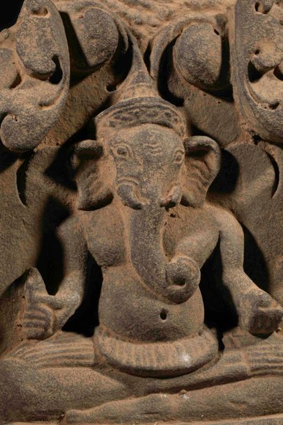 null Frieze of a sanctuary lintel illustrated with a seated ganesh dressed in a short...