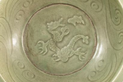 null Dish in thick Longquan porcelain with incised decoration under a monochrome...