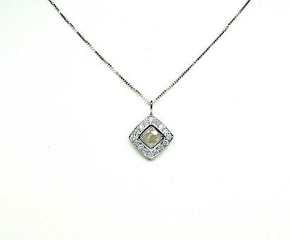 null White gold pendant centred on a faceted square diamond weighing 0.35 c approx....