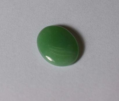 null On paper, a stone JADE NATURAL quality A cabochon oval origin (Myanmar) BURMA...