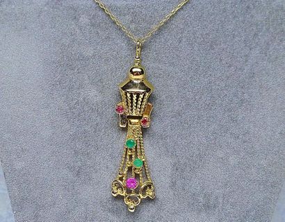 null Articulated yellow gold pendant set with green and red stones - gold 4,30 g...
