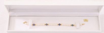 null BRACELET IN WHITE AND BLACK CULTURE PEARLS D . 4/5mm

L : 16 cm