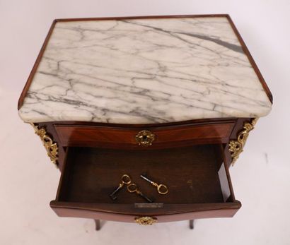 null SMALL TABLE MARKED LOUIS WRITING TABLE XV

In marquetry of curly veneer, with...