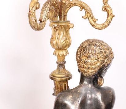 null PAIR OF ITALIAN "YOUNG MOORISH" TORCH HOLDERS. 

Made of lacquered and gilded...