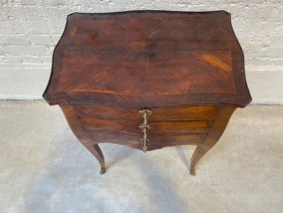 null SMALL "CHIFFONNIERE" COMMODITY veneered and inlaid on all sides in rosewood,...