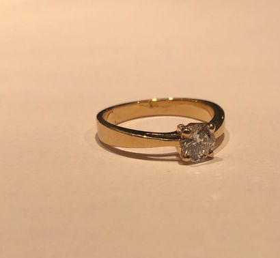null 
yellow gold solitaire ring.

GHSI quality diamond weighing 0.5 carat on a yellow...