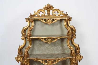 null RARE PAIR OF VENETIAN BAROQUE SHELVES 

Made of carved and gilded wood, with...