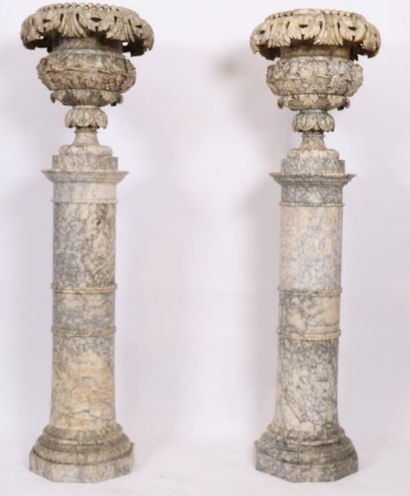 null LARGE PAIR OF VASES ON COLUMNS 

In alabaster, surmounted by a pair of vases...