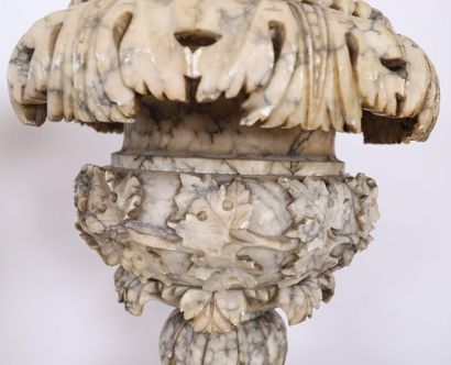 null LARGE PAIR OF VASES ON COLUMNS 

In alabaster, surmounted by a pair of vases...
