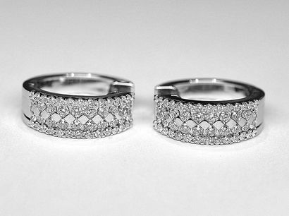 Pair of half-creoles in white gold set with...