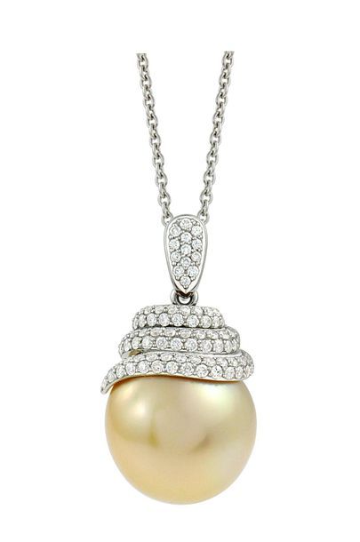 null White gold pendant supporting an important round GOLD South See pearl 15,10...