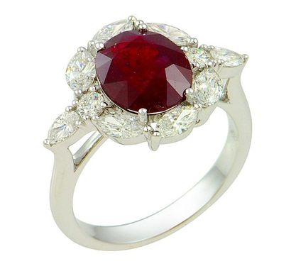 null White gold ring centered 4 claws of an oval Natural NON HEATED ruby probably...