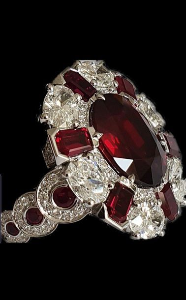  Exceptional high jewelry ring centered of an oval NATURAL NON HEATED ruby for 5.00...