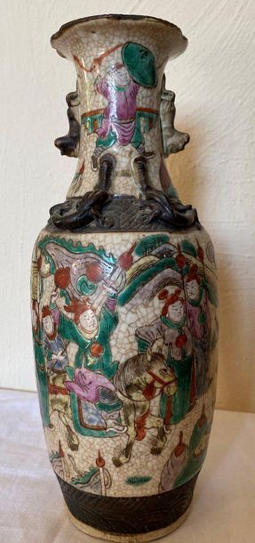 null CHINA

Earthenware vase of NANKIN of baluster shape - A decoration of war games...