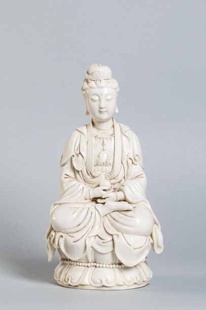 null The Boddhisatva GUANYIN figured sitting in meditation on a lotiform base dressed...