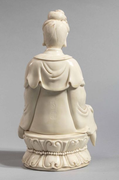 null The Boddhisatva GUANYIN figured sitting in meditation on a lotiform base dressed...