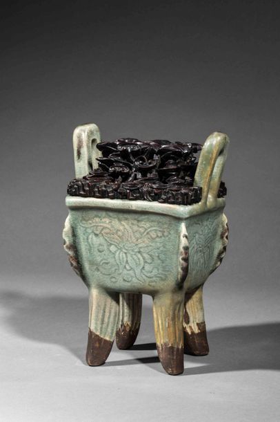 null Archaic Fangding perfume burner in thick porcelain incised with floral motifs...