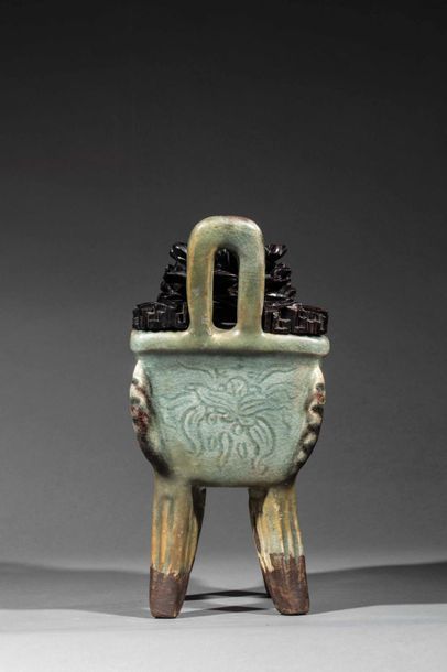 null Archaic Fangding perfume burner in thick porcelain incised with floral motifs...