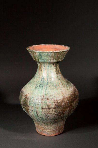 null Vase of Hu shape baked burial with green lead glaze. China. Han dynasty. 206...