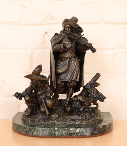 null GROUPE EN BRONZE "VIOLONNISTE ET JEUNE JOUEUR DE CORNEMUSE AU CHIEN"

En bronze...