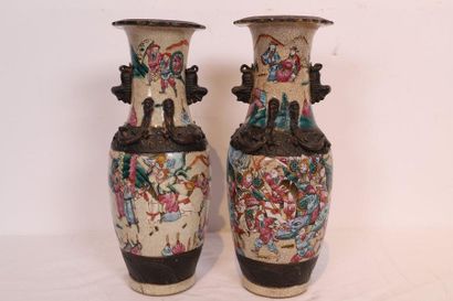 null CHINA - CANTON

Pair of cracked ceramic baluster vases. Mark under the base.

H:...