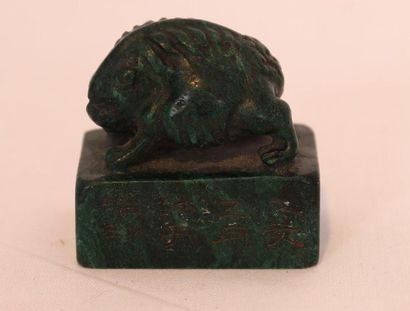 null GREEN STONE CACHET of rectangular shape surmounted by an animal. One side engraved...