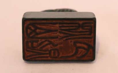 null GREEN STONE CACHET of rectangular shape surmounted by an animal. One side engraved...