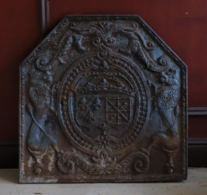 null CAST IRON CHIMNEY PLATE

decorated with the arms of France and Navarre held...