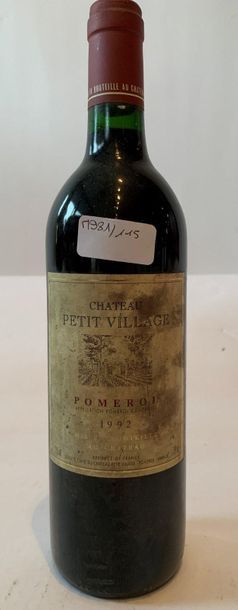 null 1 BTE "CHÂTEAU PETIT VILLAGE" - Pomerol - 1992 

Stained label

Low level n...