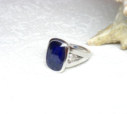 White gold ring set with a large Sapphire...