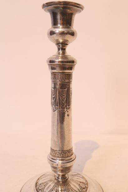 null CANDLESTICK IN SILVER PLATED COPPER

Decorated with palmettes, scrolls and falling...