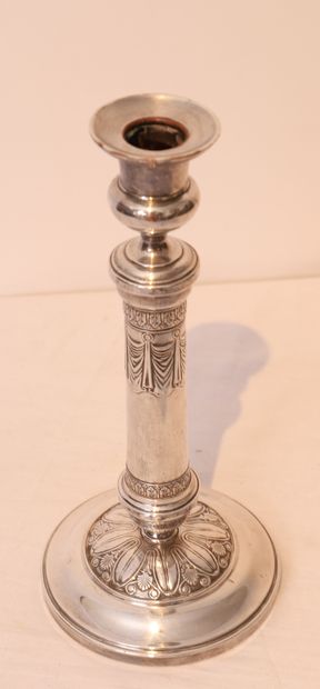 null CANDLESTICK IN SILVER PLATED COPPER

Decorated with palmettes, scrolls and falling...