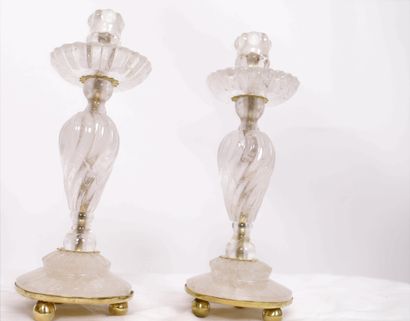  PAIR OF ROCK CRYSTAL CANDLESTICKS 
With a twisted baluster shaft, resting on a circular...
