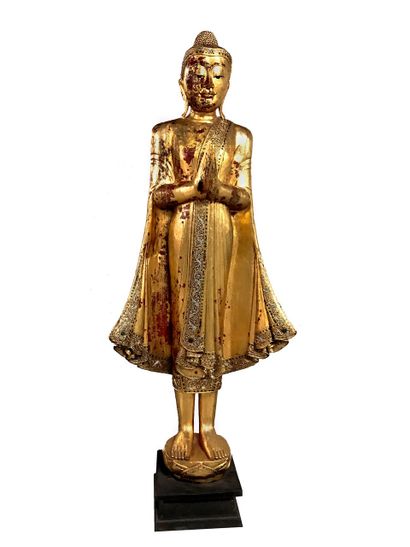 null LARGE GILDED WOOD AND STONE INLAID BUDDHA WITH JOINED HANDS

Southeast Asia,...