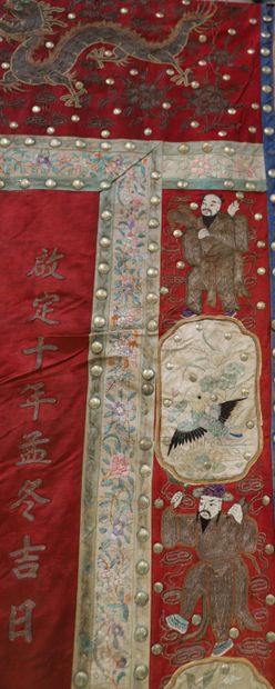 null CHINESE SILK TENTURE, copper button and silver threads with woven decoration...