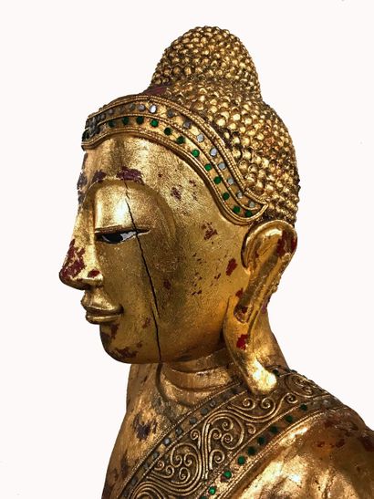 null LARGE GILDED WOOD AND STONE INLAID BUDDHA WITH JOINED HANDS

Southeast Asia,...