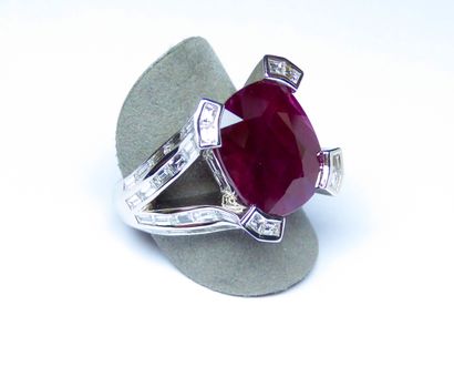 null White gold jewelry ring centered with a large oval NATURAL ruby probably Burmese...