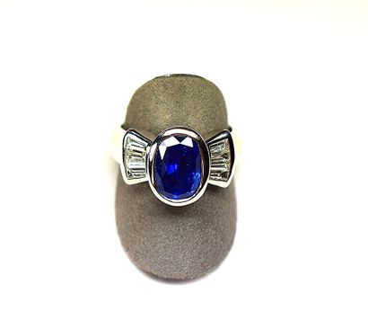 null White gold ring centered in close of a NATURAL BIRMAN NON HEATED oval sapphire...