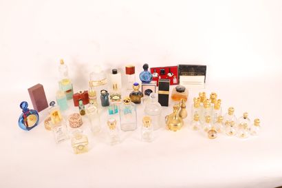 LOT OF ABOUT FORTY BOTTLES OF PERFUMES 
including...