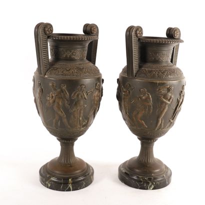null PAIR OF ANTIQUE VASES WITH TWO HANDLES

Decorated with a frieze of characters...