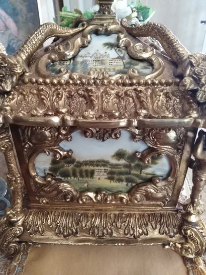 null 
JEWELRY BOX in gilt bronze and porcelain plates with animated landscapes 




Richly...