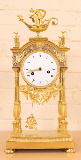 null GILT BRONZE PORTICO CLOCK RESTORATION 

In gilt bronze and chased, with four...